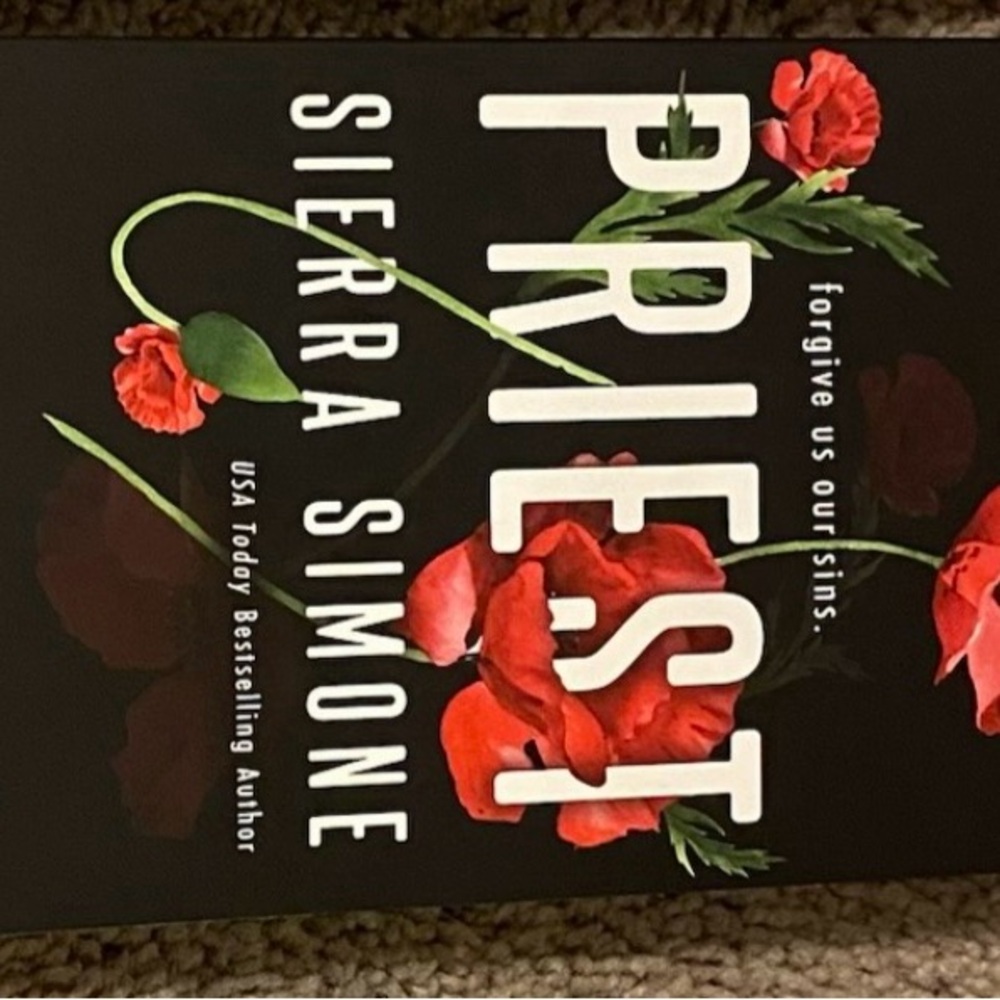 'Priest' Book with Red Accents